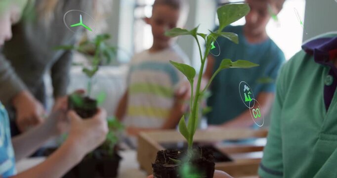Child lifting seedling, causing AR overlays, kids inspecting roots and filling wood tray for lesson