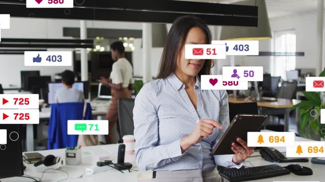 Office manager tapping tablet, creating flooding badges condensing nearby while checking KPIs