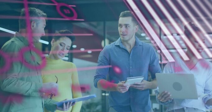 Team grouping as man in green joining showing tablet laptop pink data drifting for business review