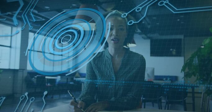 HUD appearing, woman pausing writing, lifting head, presenting tech with expanding HUD circuits pen