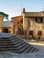 Naklejka premium Stone steps leading to historic Monticchiello village, Italy.