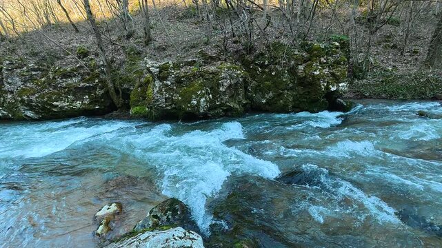 Turquoise River Flowing Downstream With White Rock Foreground. Ozren Mountain, Sokobanja region. Balkans, Serbia.