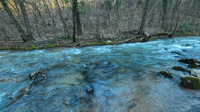 Shaded Forest River Flowing Upstream Between Hills . Ozren Mountain, Sokobanja region. Balkans, Serbia.