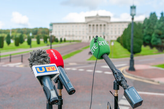Microphones from UTV, BBC Newsline and RTE outside Parliament Buildings, Stormont, Belfast
