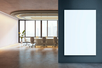 Vertical blank poster mockup in modern conference room with clean contemporary design, large windows and soft background light for presentation.. 3D Rendering