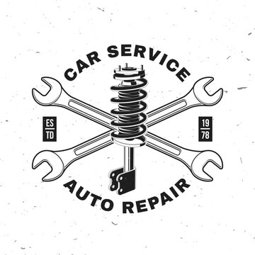 Auto service logo, emblem, badge. Vector. For expert service car repair center, restoration, car club with wrenches, and shock absorber silhouette. Service car repair, restoration and car club design