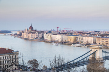Obraz premium panorama view at the parliament with Danube river in Budapest