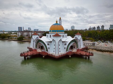 Majestic aerial view of Melaka Straits Mosque at sunset, the floating mosque in Malaysia