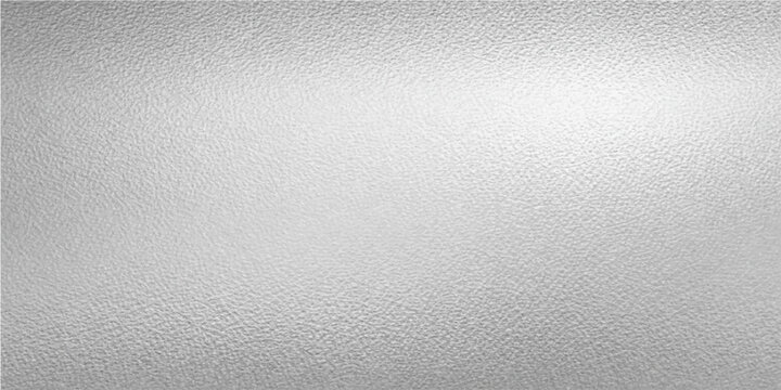 Subtle grey texture with a gradient light, this image offers a captivating blend of simplicity. The gradient light adds depth, creating a visually pleasing surface. 
