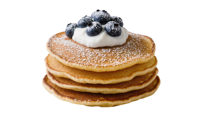 Isolated stack of fluffy golden pancakes topped with fresh blueberries, whipped cream, sugar