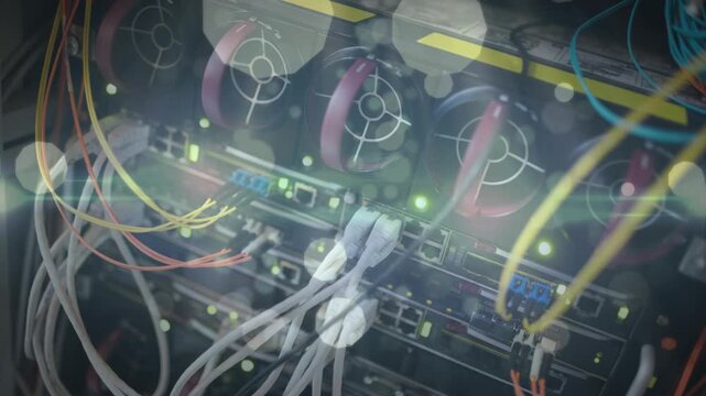 Animation of lights and dots floating over computer wires