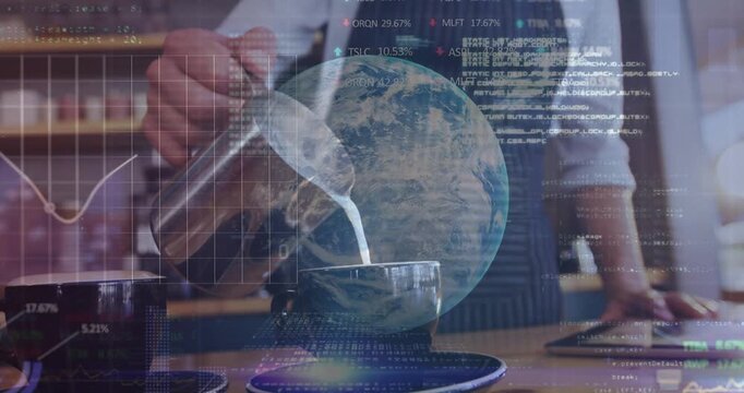 Barista pouring milk into cup, globe pulsing and finance tickers while stirring spoon near tablet