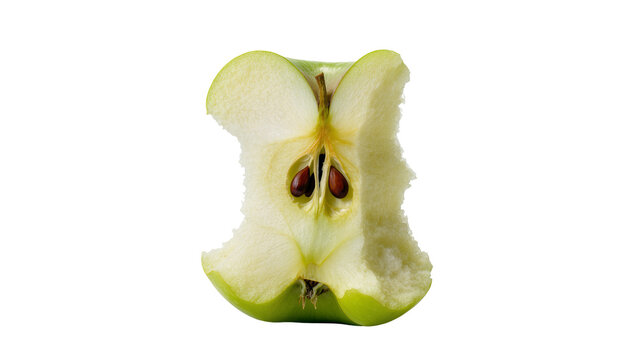 Isolated half-eaten green apple core cut in half revealing seeds fresh and healthy
