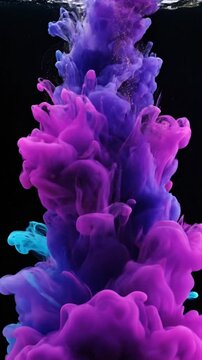 Abstract ink flow in water with vibrant colors on a dark background