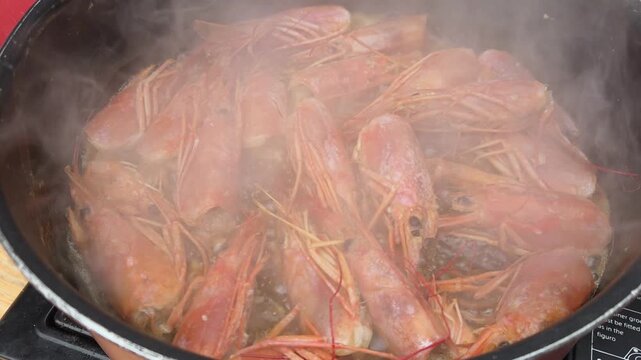 Sofrito de cabezas de Gambas humeantes