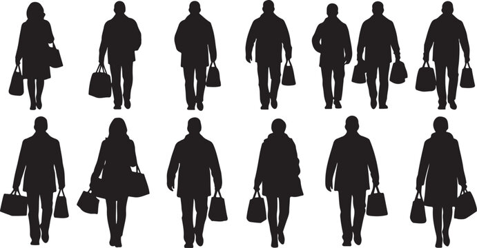 Silhouettes of people walking with shopping bags downtown
