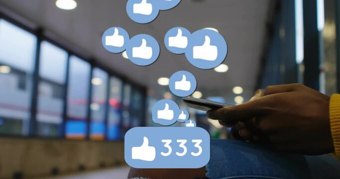 Woman holding smartphone in transit lounge watching like counter rising with floating thumb icons