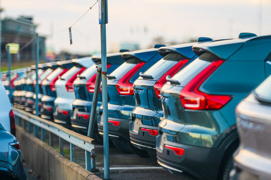 Gothenburg, Sweden - december 31 2025: Line of modern cars parked closely in outdoor lot.