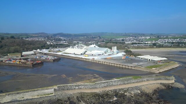 Par, Cornwall, England: DRONE VIEWS: Par Docks with the town of Par and Par Sands beach in the b/g. The Docks is a milling centre and also receives a slurry form of china clay for transporting.