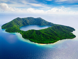 Aerial View of Satonda Island Saltwater Crater Lake and Coral Reefs in Indonesia © Wahde Stock