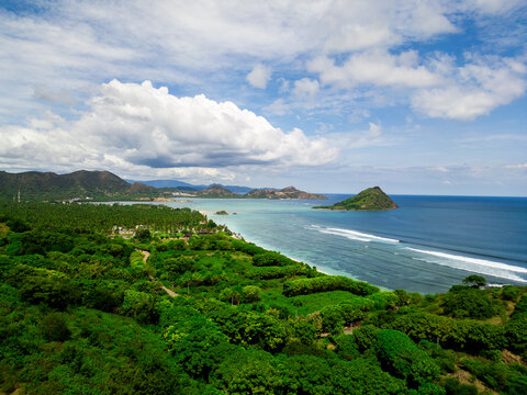 Scenic Seger Beach with Iconic Rock Formations and Turquoise Ocean in Kuta Lombok