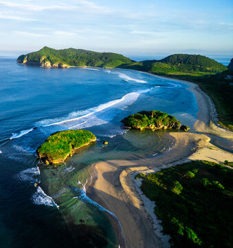 Lawar Beach with White Sand and Rugged Cliffs in West Sumbawa Indonesia