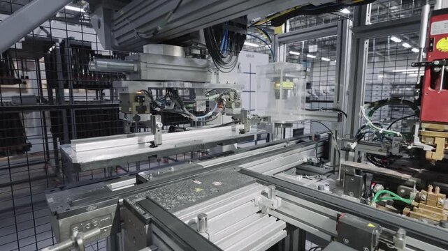 Skopje, Macedonia - Apr 28, 2025: High precision robot cable assembly production line in a modernized manufacturing environment