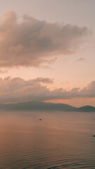 Fototapeta premium Minimalist Zen Meditation Background with Calm Ocean and Sunset Clouds