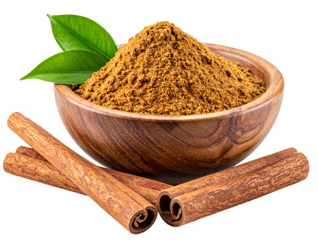 Ground spice and cinnamon sticks in a wooden bowl, garnished with leaves