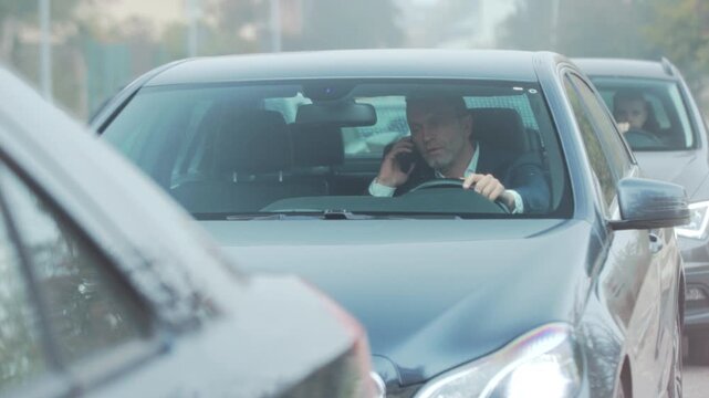 Frustrated driver protesting in congestion, Irate individual vocally protesting amidst busy city gridlock