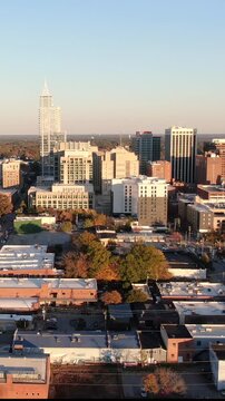 Vertical Drone View of Downtown Raleigh Skyline at Golden Hour