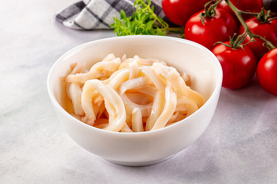 Canned marinated squid rings heap