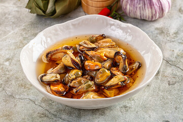 Fototapeta premium Canned mussels in oil and spices