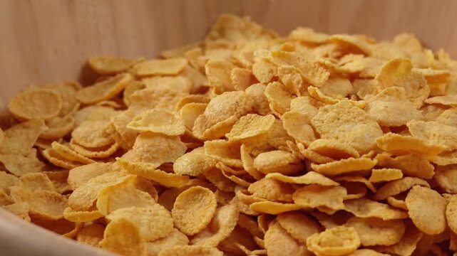 Cornflakes in a wood bowl
