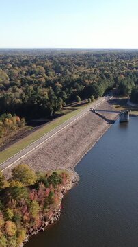 Vertical Drone View of Falls Lake Earthen Dam and Reservoir Infrastructure