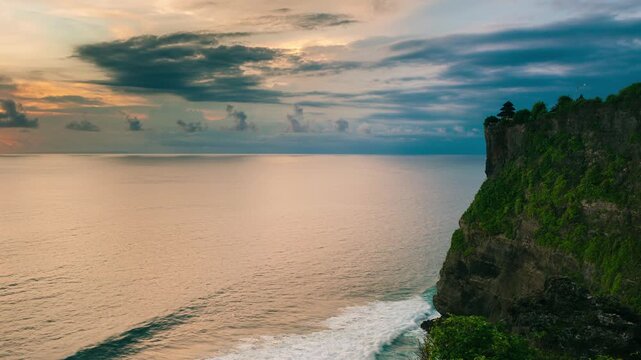 Bali, Indonesia, aerial view of Pura Luhur Uluwatu temple at sunrise.