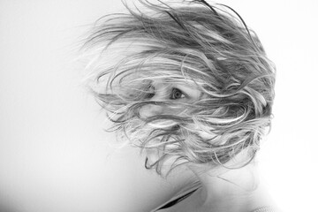 Fototapeta premium Woman hair flowing in front of face