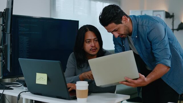 software developer talk strategy plan to executive write prompt AI bot IT app program data analytics in tech startup office.Projected visuals and glowing code on screen.AI chatbot technology concept