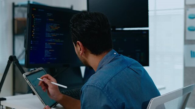 Dev programmer and software engineer working together on ai assistant develop project.Coding team discussing script on laptop. Concept of digital innovation and tech startup office