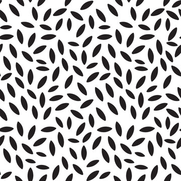 Minimalist seamless pattern featuring scattered black almond shapes on a clean white background