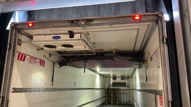 Empty refrigerated truck trailer interior wide