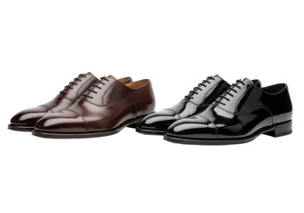 Fototapeta premium Two pairs of highly polished men's cap-toe oxford shoes, one dark brown and one patent black, displayed side-by-side on a transparent studio background, conveying immaculate sophistication