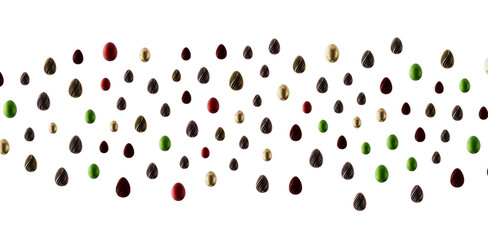 Decorative Easter eggs in various colors scattered on white background. Holiday season concept for design. Festive and j