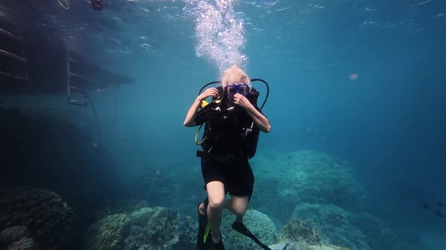 A scene of tourists scuba diving in the Red Sea off the coast of Sharm El Sheikh, Egypt.