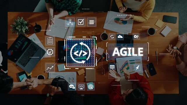 An overhead view of a team collaborating in a meeting, utilizing digital tools and visual aids to enhance agile project management and foster effective teamwork. Raster