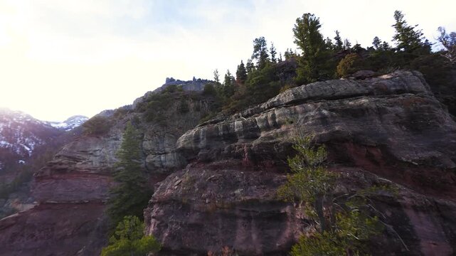 Red rocky mountain dive down high-speed FPV video Ouray Colorado 4K