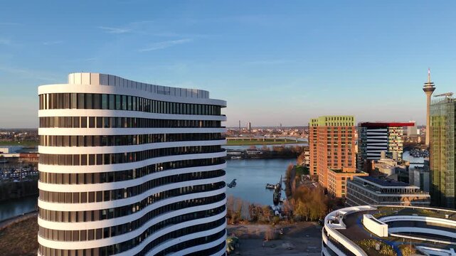 Side drift past Neuer Zollhof with Rheinturm view