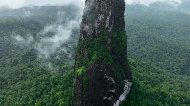 Pico C&atilde;o Grande, volcanic plug peak on S&atilde;o Tom&eacute; and Pr&iacute;ncipe, drone perspective