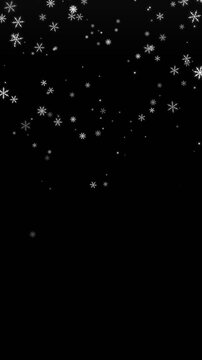 Snowflakes falling on dark vertical background: winter snow overlay animation with glowing particles fading effect 