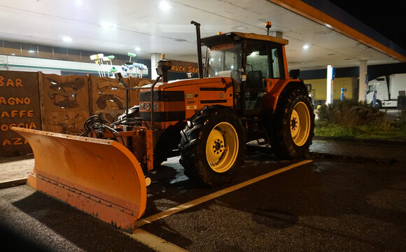 Prague, Czech Republic - March 11, 2026: The colorful tractor Same Antares II 130 is parked near the gas station at Prague, Czech Republic